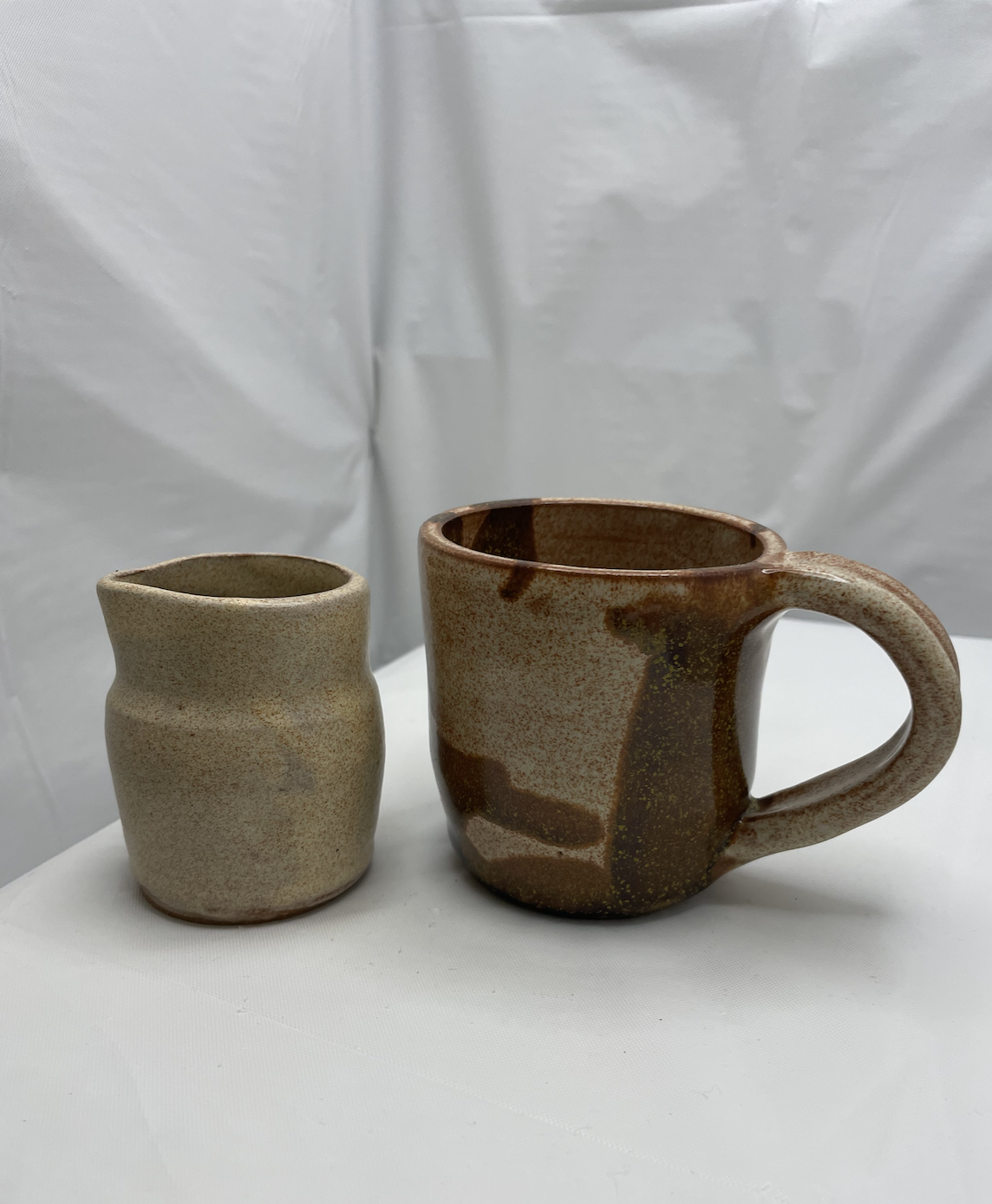 Handcrafted pottery mug and vase